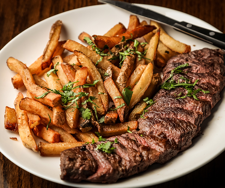steak and fries on a plate