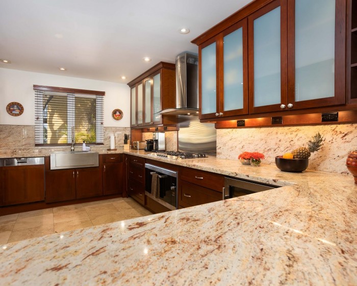 large kitchen with granite countertops
