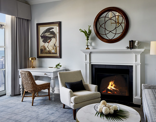 view of a cozy wedding suite with a fireplace