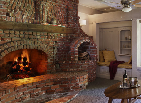  fire place and wooden carved reading nook in one of the suites