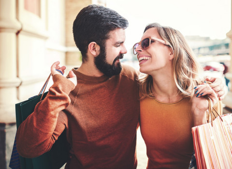 couple smiling and shopping
