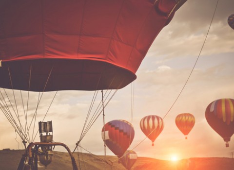 hot air balloons with sunrise