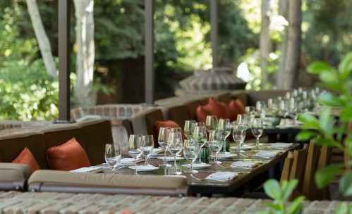 outdoor patio with glass table setting