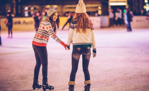 two girls ice skating
