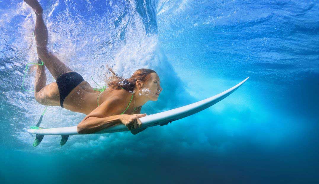 a woman surfing