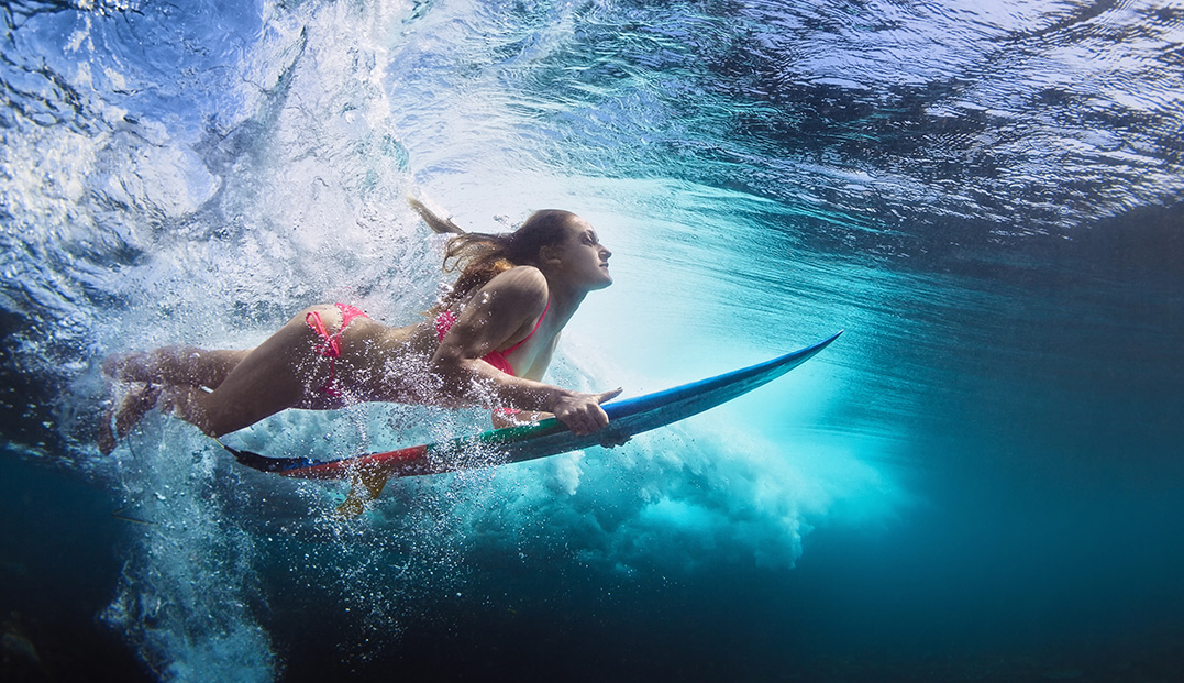 a woman surfing