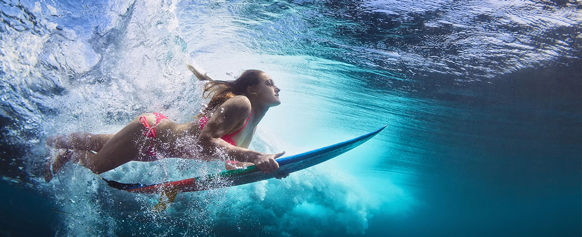 view of a woman surfing