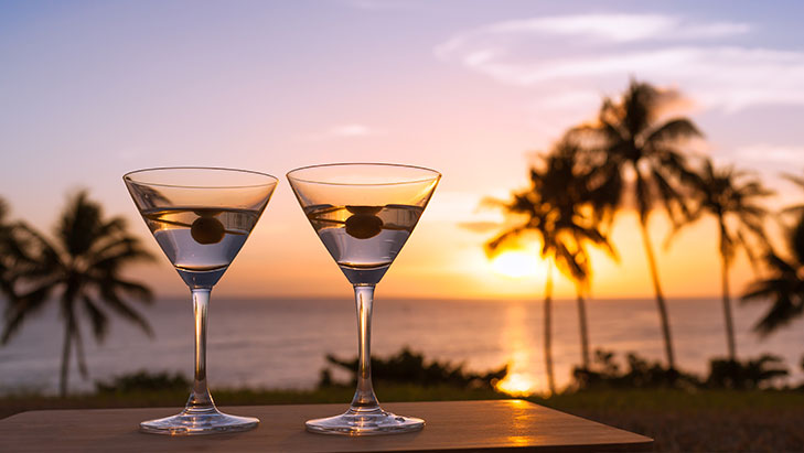 view of two martinis during a sunset