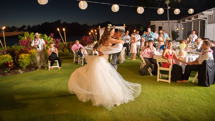 view of newlywed couple dancing at their reception