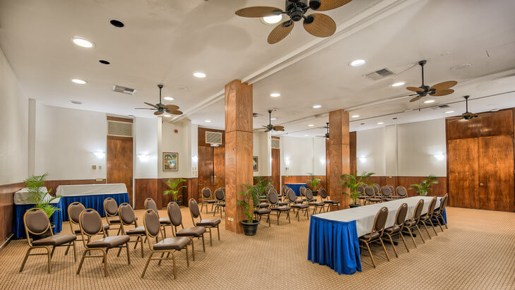 Resort meeting space with seating and high ceilings 