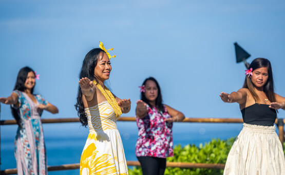 women performing traditional hula dance 
