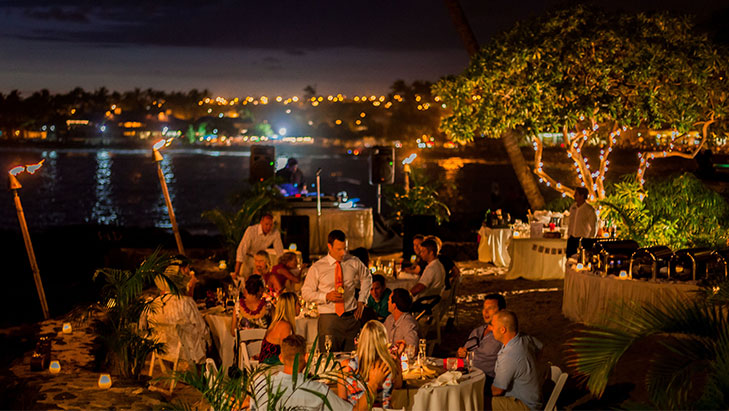 view of a people dining and socializing at royal kona resort hawaii alii surf terrace