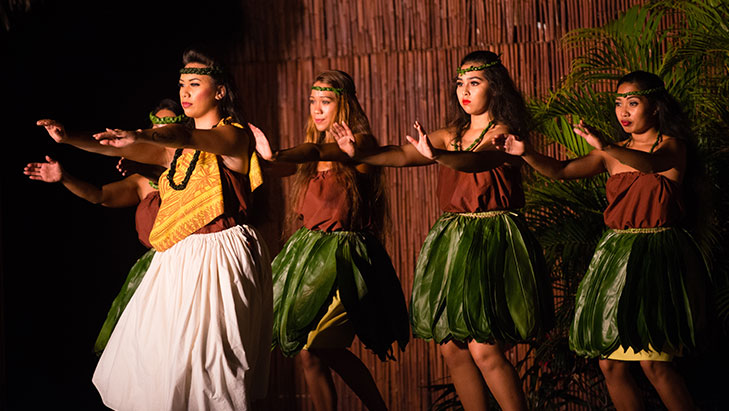 view of performers at a luau