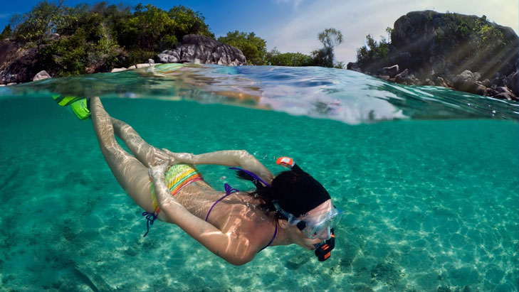 view of a woman snorkeling