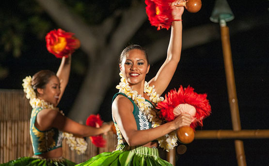 performers dancing at a luau