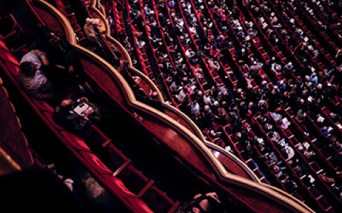 aerial view of a crowded theater from the second floor