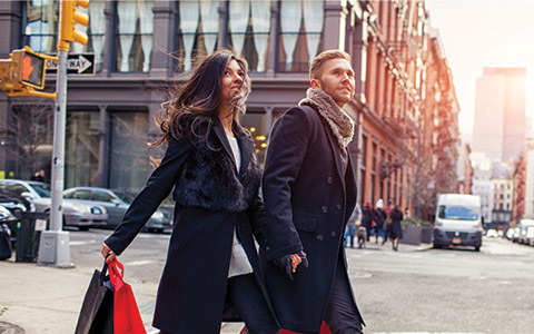 Couple walking through harold square