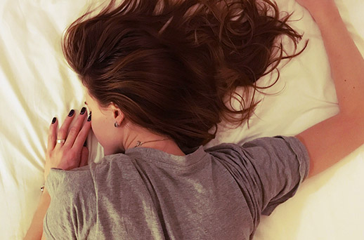 woman laying in bed