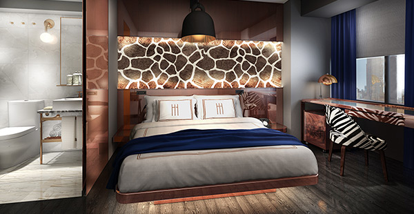 guest room with a giraffe print behind the bed, white linens, blue blanket, zebra chair, and a copper bed frame