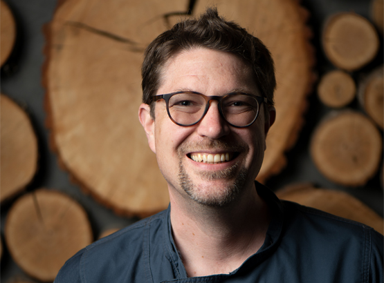 headshot of the chef smiling