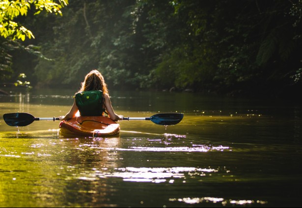 a girl enjoying a kayak