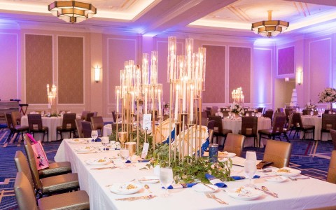 wedding room with candles on it and some decoration 
