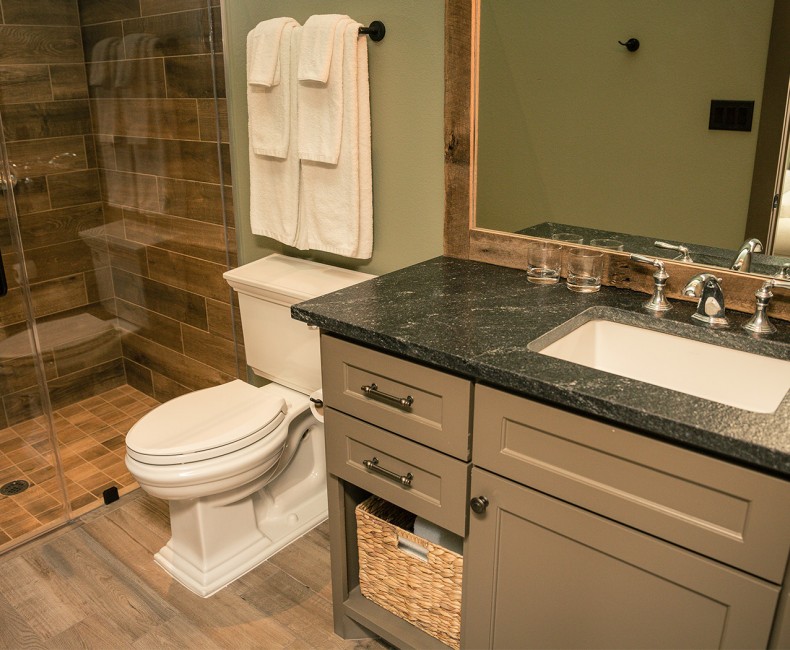 view of tiled bathroom with walk in shower