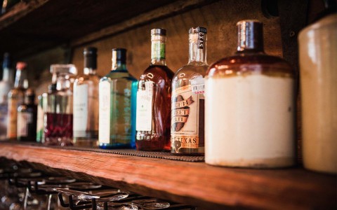 liquor on a wooden shelf