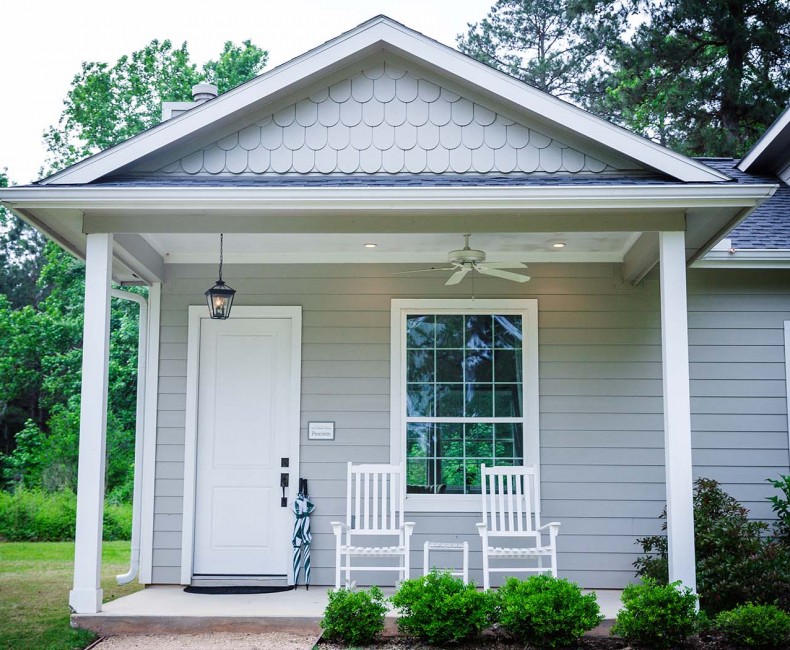 front porch of a grey cottage