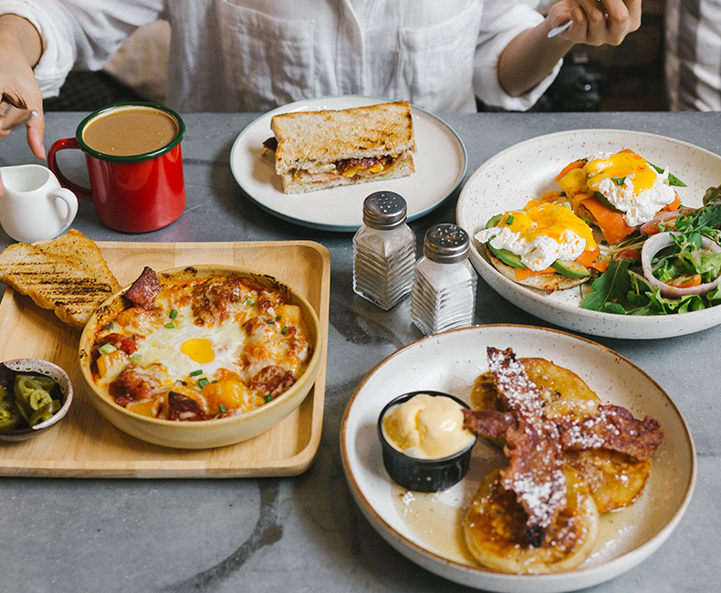 various breakfast foods plated nicely