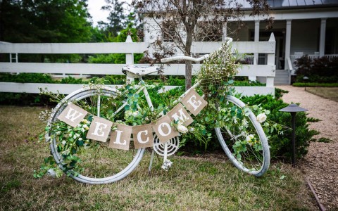 vintage bike set up with welcome sing