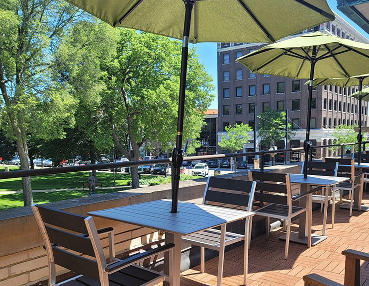 the lounge terrace with tables and parasols