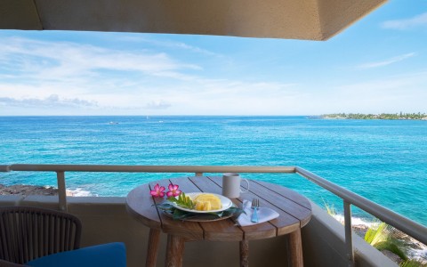 breakfast served at the terrace with a beach view 