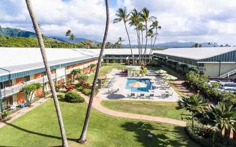 Aerial view of a part of the hotel with palm trees 