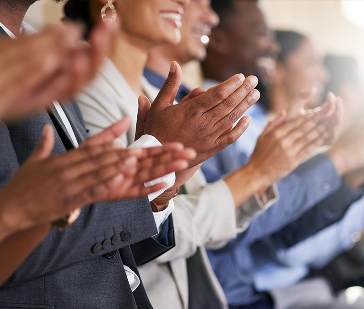 Group of people clapping