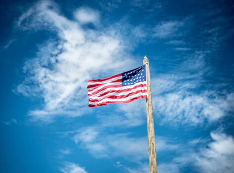 American Flag Against Blue Sky
