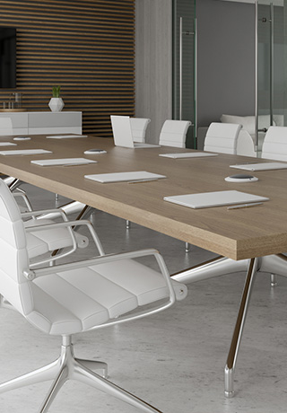 conference table in a room with white rolling chairs