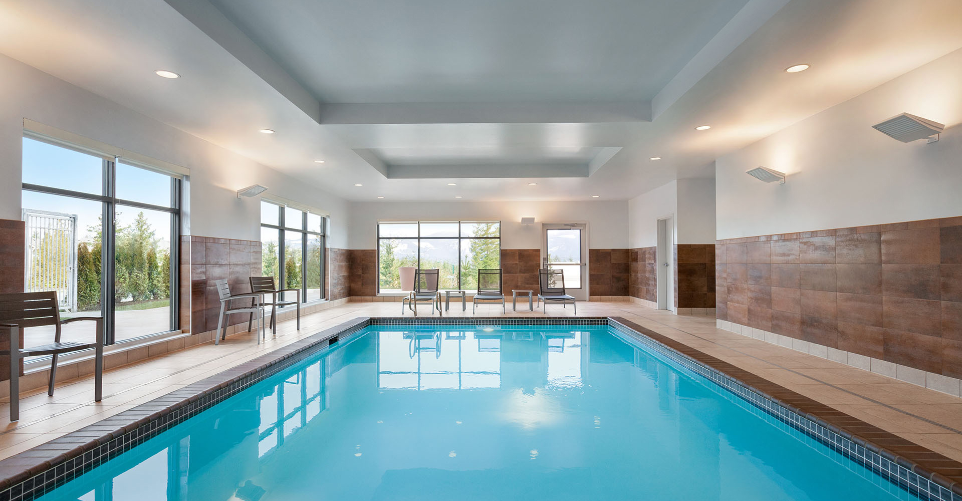 the indoor pool with light shining in