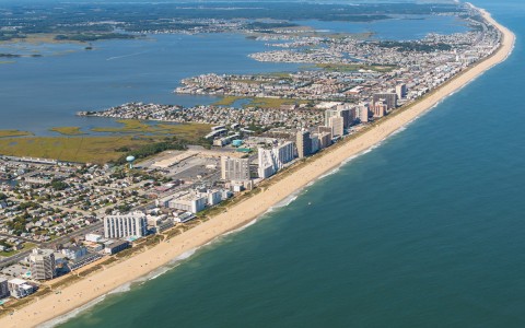 panoramic aerial view of a city close to the beach at daytime