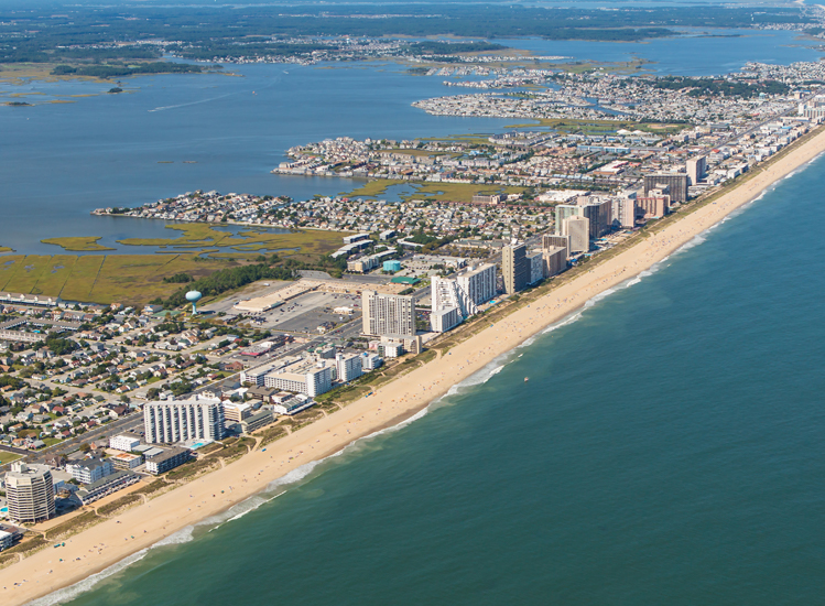 panoramic aerial view of a city close to the beach at daytime