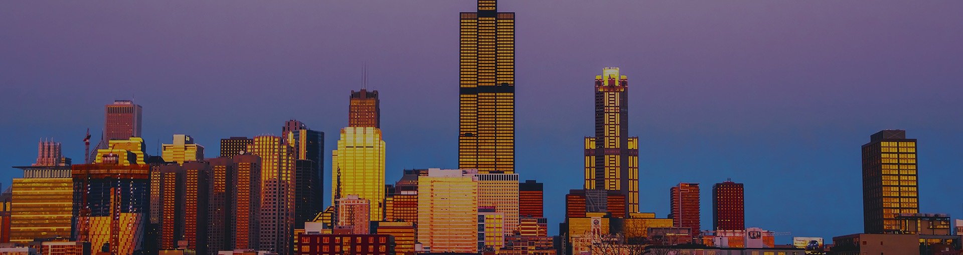 Sunset reflecting off of city buildings
