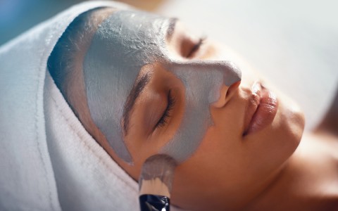 close up view of a woman having a facial treatment 