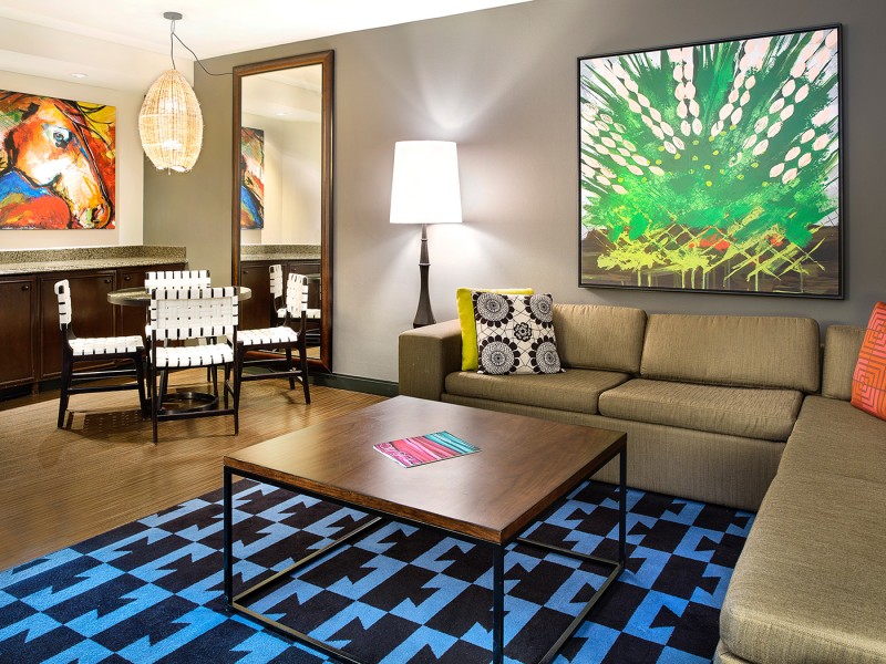 sectional couch coffee table and blue accent rug