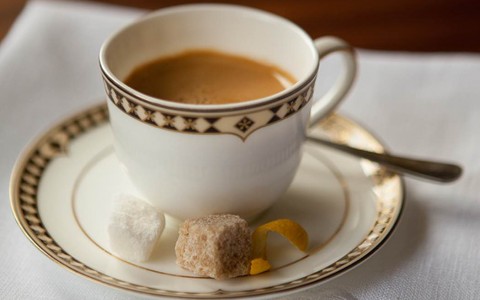 coffee and spoon on a plate