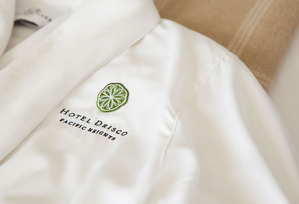 white robe with hotel logo