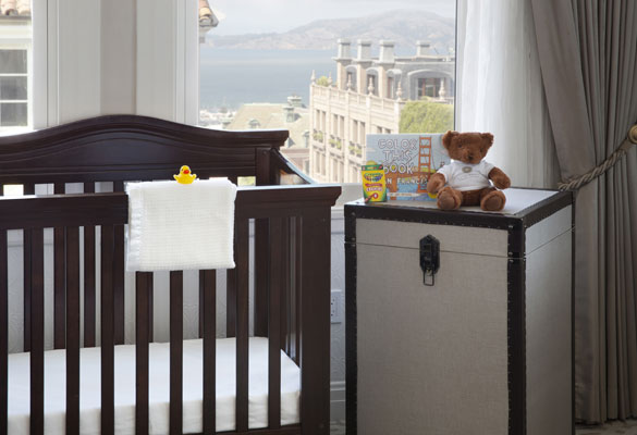 crib and hamper overlooking city