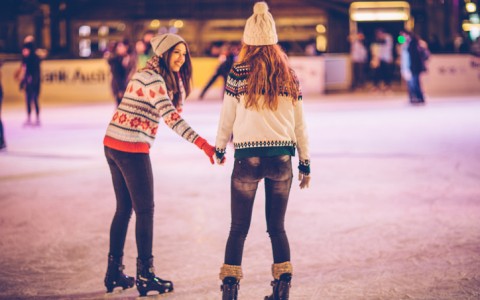 two girls ice skating