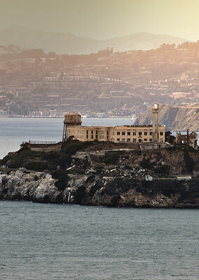 Building on rock island surrounded by water