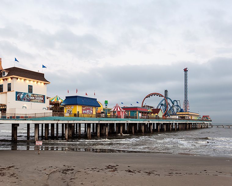 View of the Galveston Pier from the beach