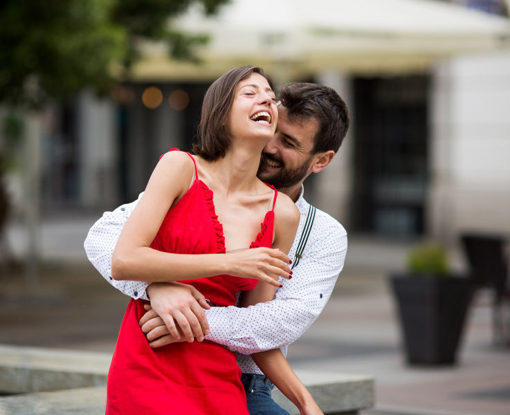 couple hugging and laughing